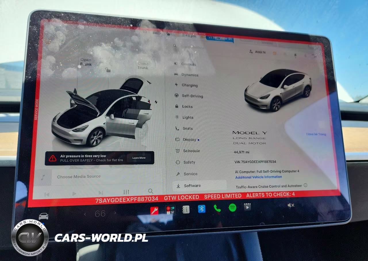 2023 Tesla Model Y VIN:7SAYGDEEXPF887034 - 9