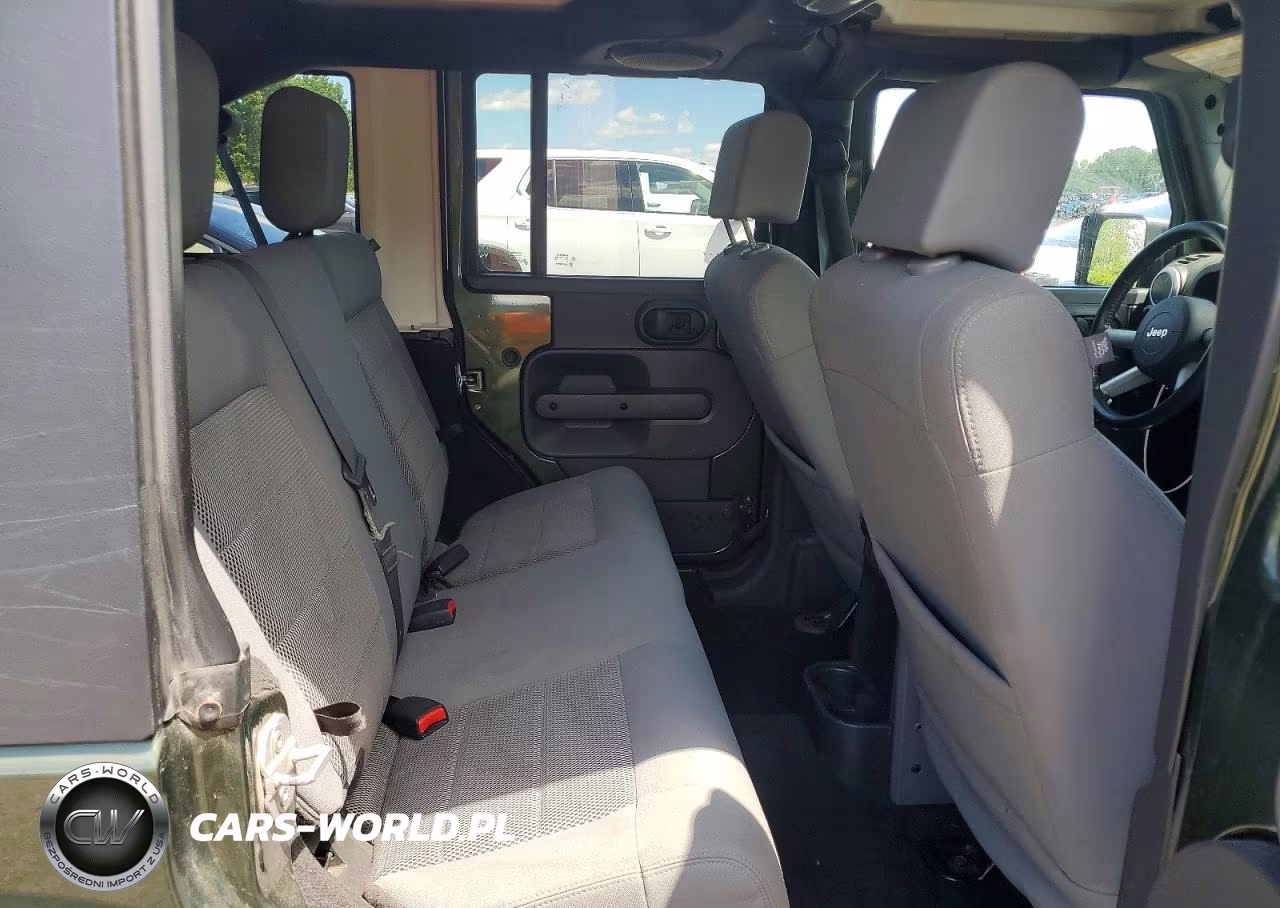 2009 Jeep Wrangler Unlimited Sahara VIN:1J4GA59159L733168 - 11