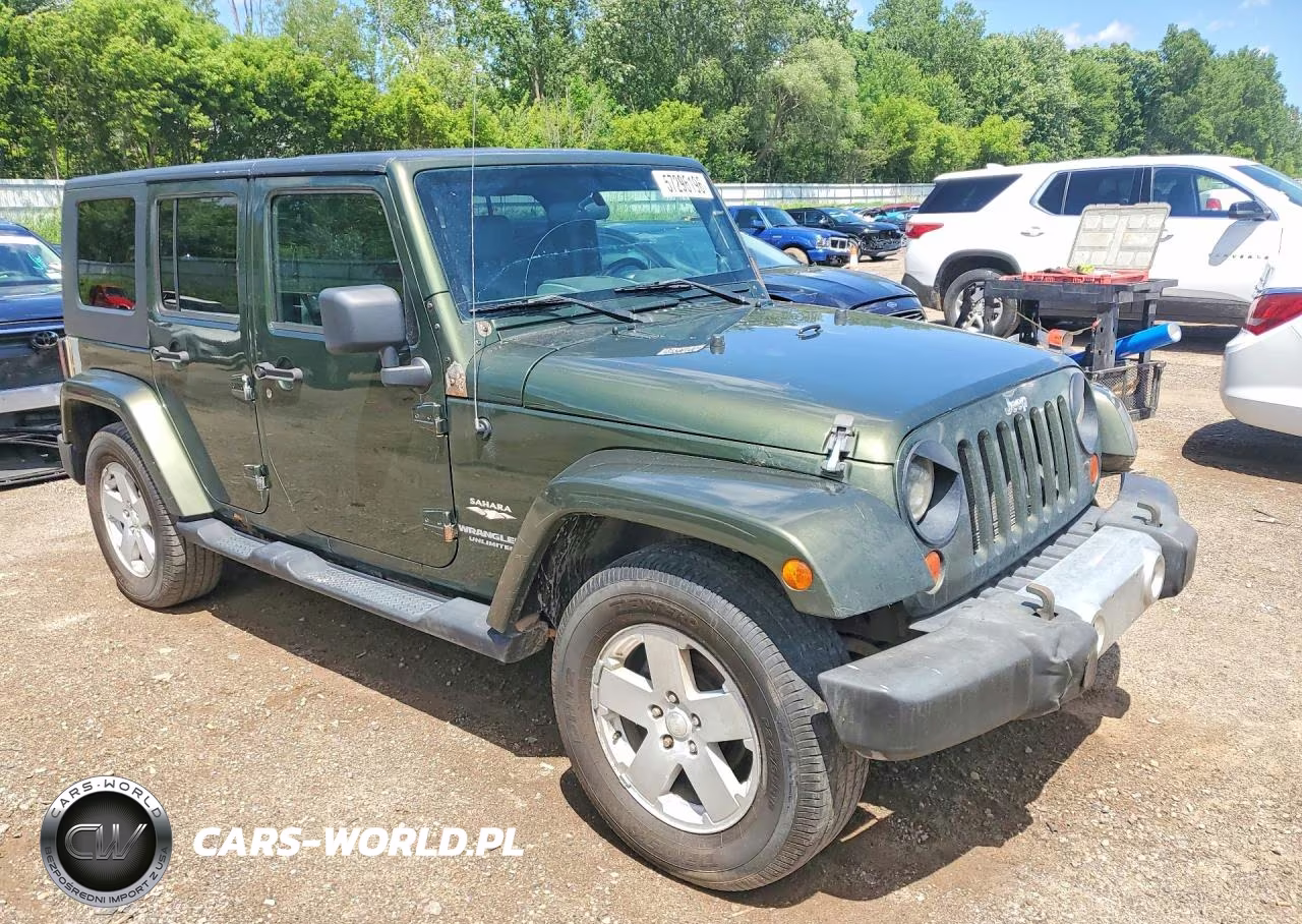 2009 Jeep Wrangler Unlimited Sahara VIN:1J4GA59159L733168 - 4