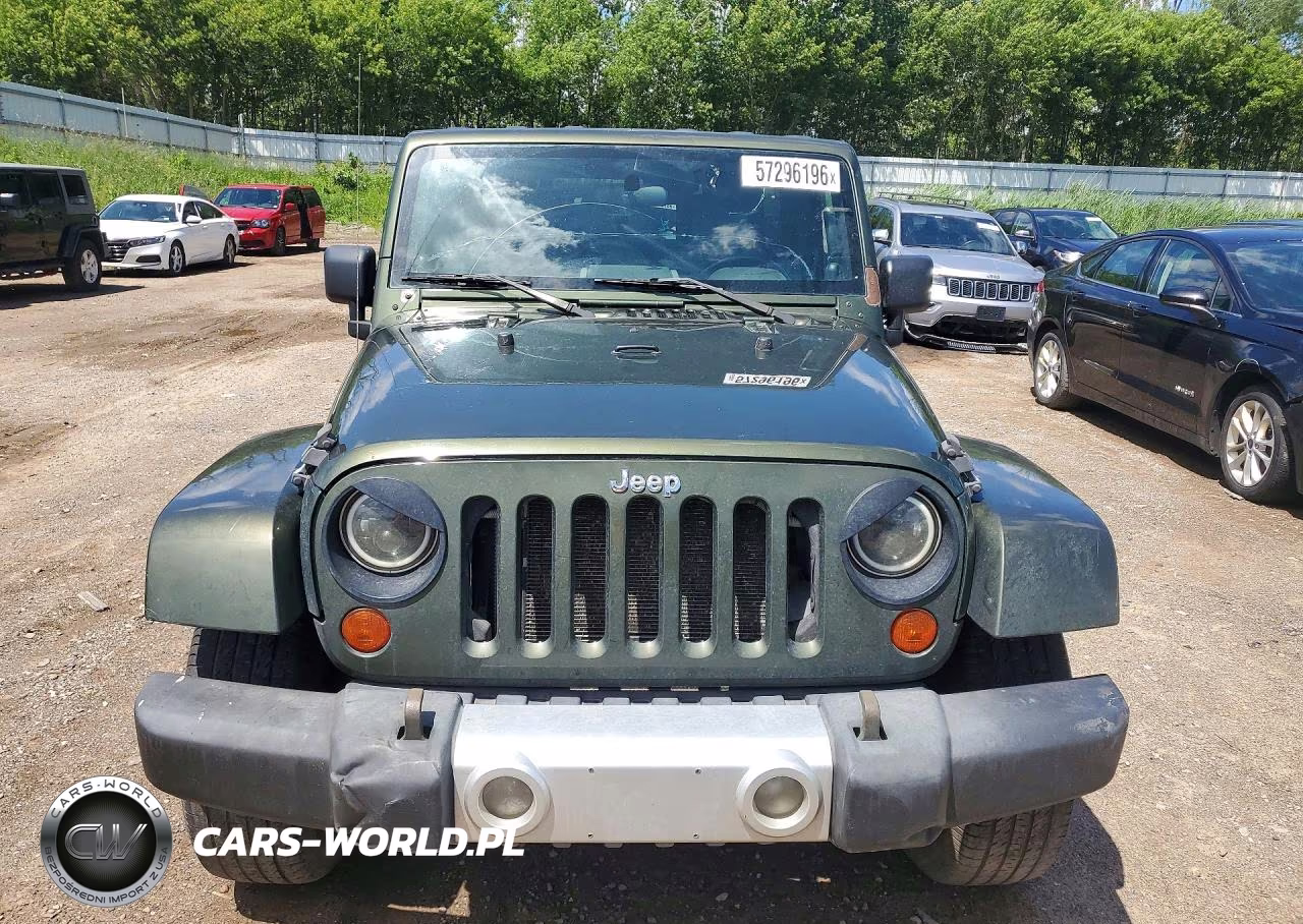 2009 Jeep Wrangler Unlimited Sahara VIN:1J4GA59159L733168 - 5