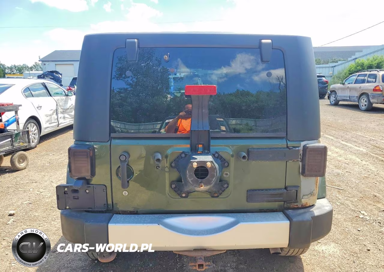 2009 Jeep Wrangler Unlimited Sahara VIN:1J4GA59159L733168 - 6