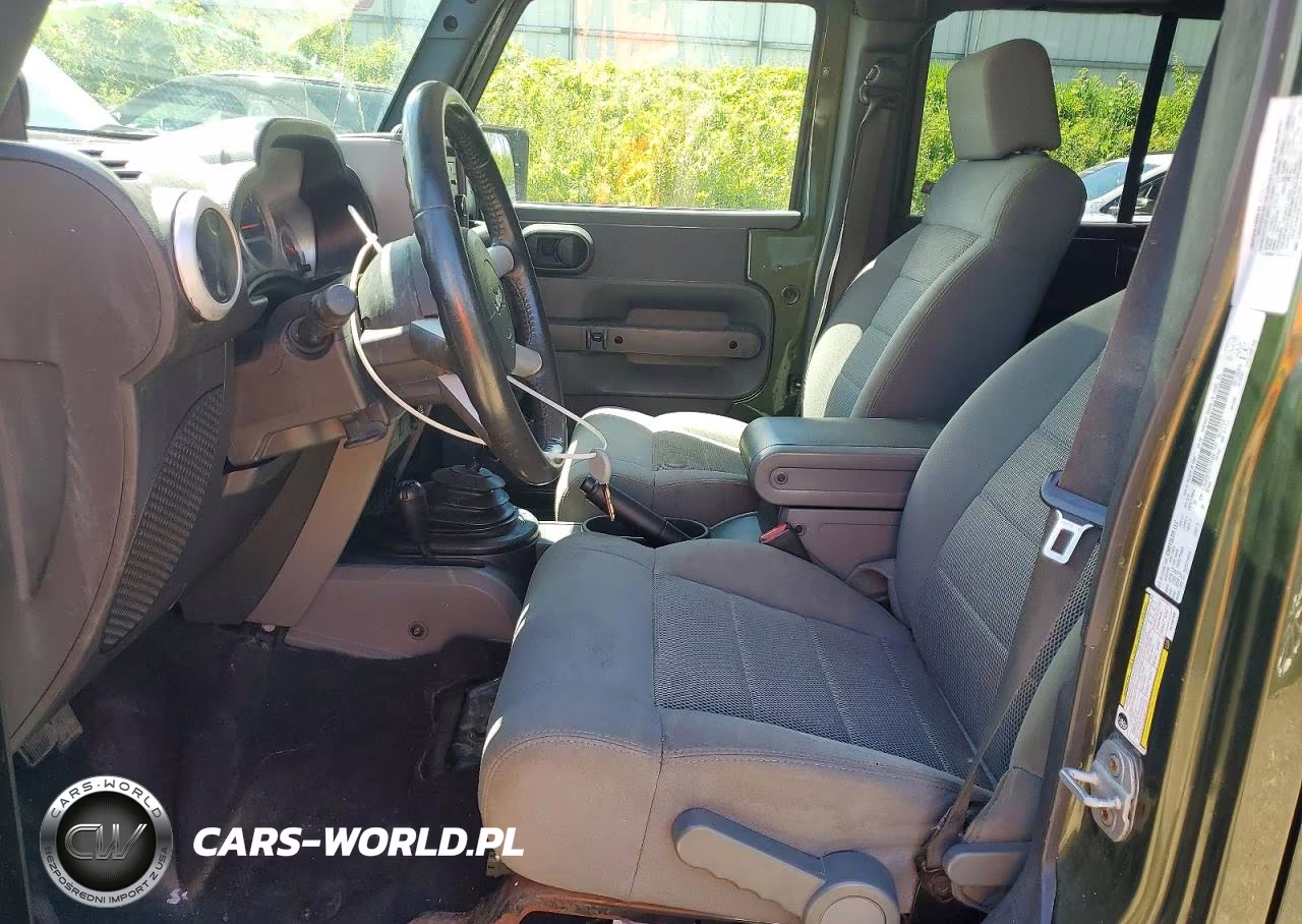 2009 Jeep Wrangler Unlimited Sahara VIN:1J4GA59159L733168 - 7