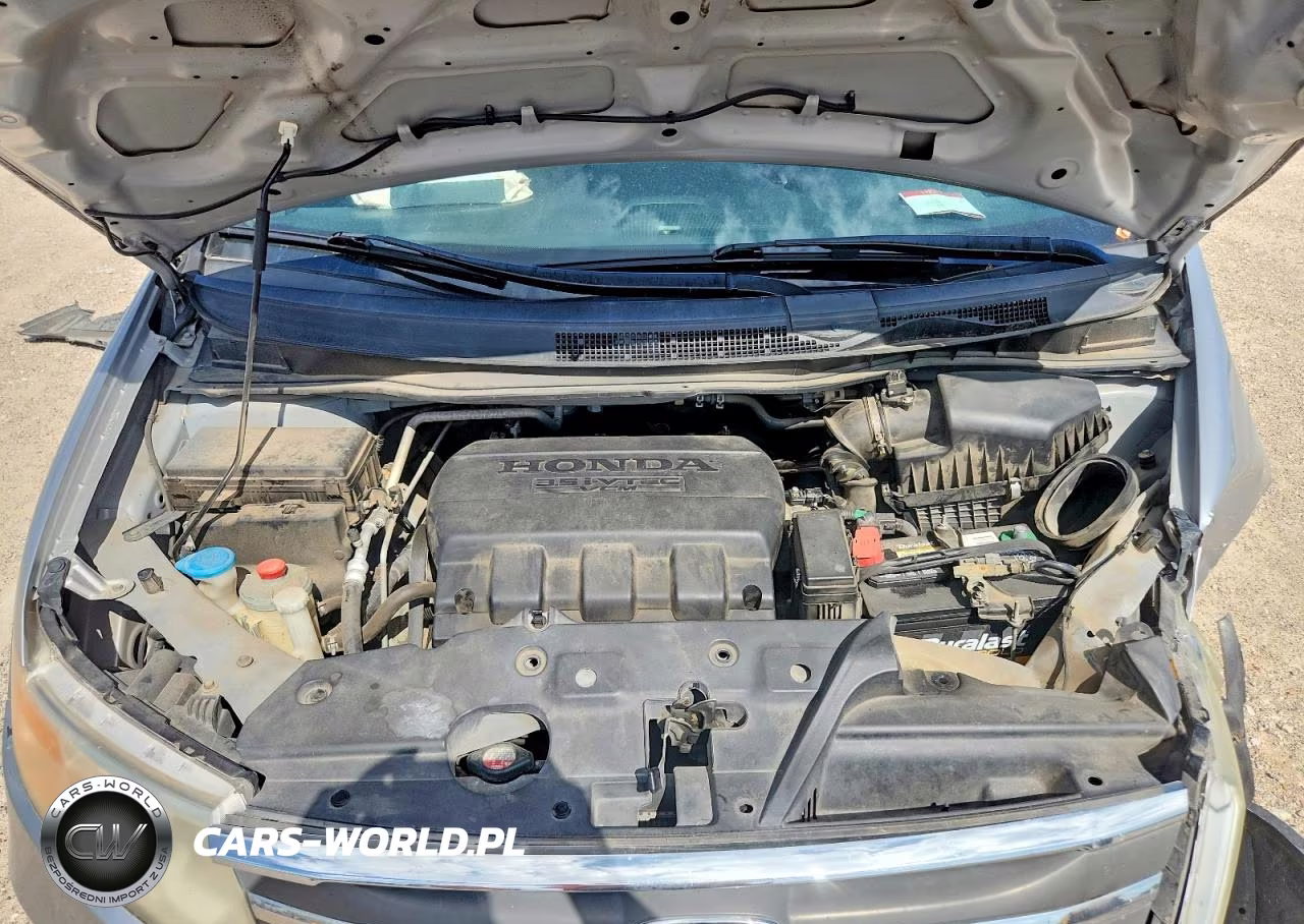 2012 Honda Odyssey Exl VIN:5FNRL5H60CB076912 - 12
