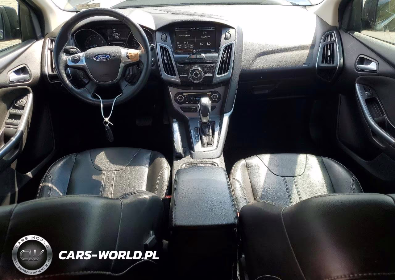 2012 Ford Focus Titanium VIN:1FAHP3N25CL352204 - 8