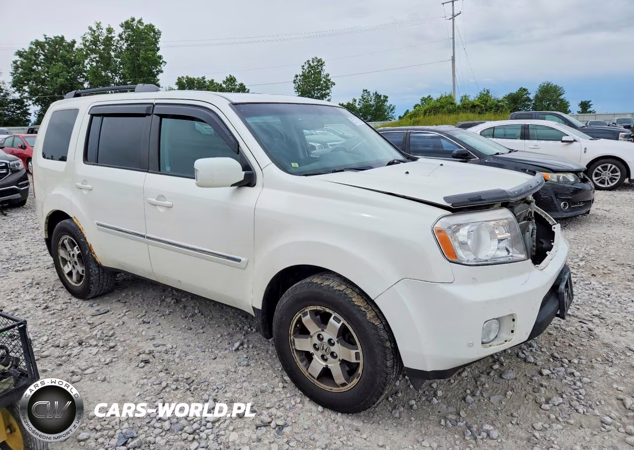 2011 Honda Pilot Touring VIN:5FNYF4H97BB505016 - 4