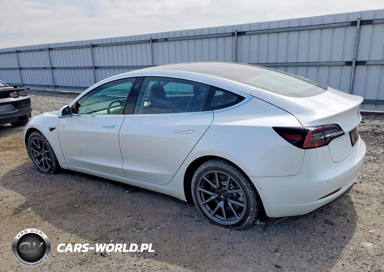 2018 Tesla Model 3 VIN:5YJ3E1EB0JF185667 - 2