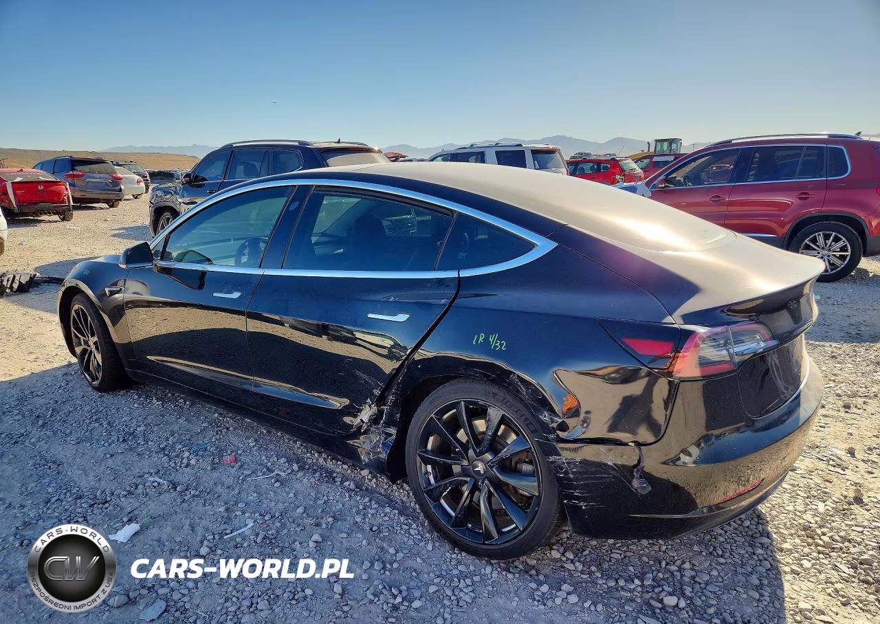 2018 Tesla Model 3 VIN:5YJ3E1EB3JF115709 - 2