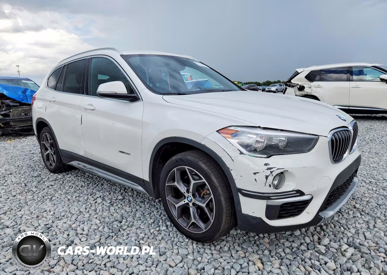 2018 BMW X1 xDrive28I VIN:WBXHT3C32J5K31622 - 4