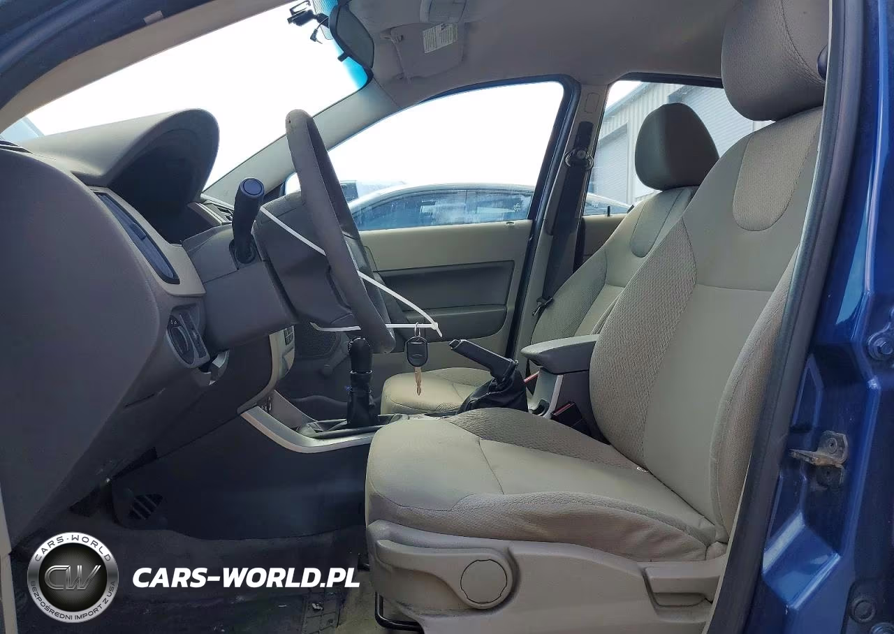 2009 Ford Focus S VIN:1FAHP34N49W200823 - 7