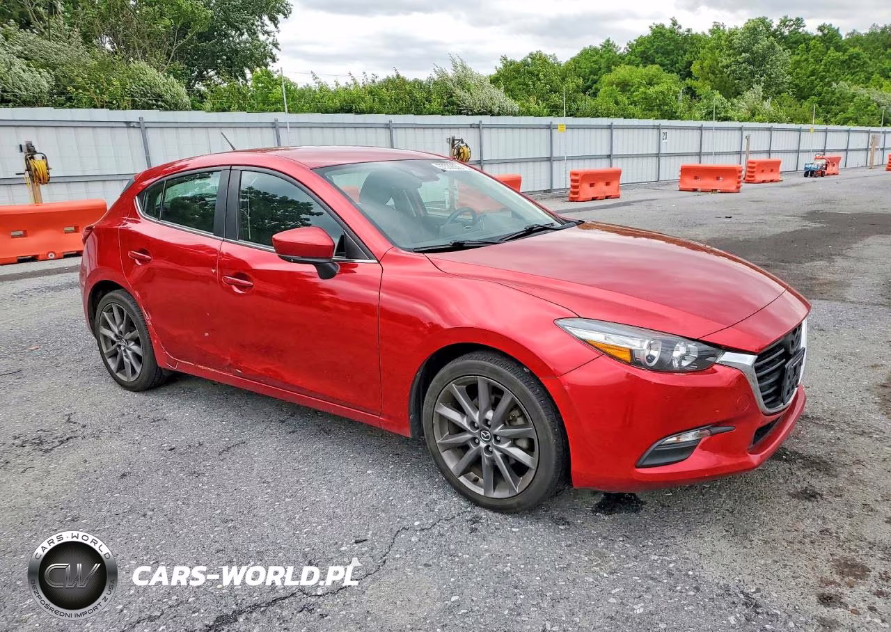 2018 Mazda 3 Touring VIN:3MZBN1L3XJM197616 - 4