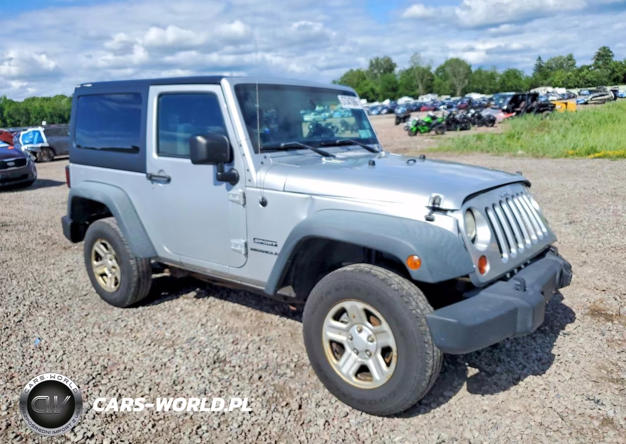 2011 Jeep Wrangler Sport VIN:1J4AA2D11BL609089 - 4