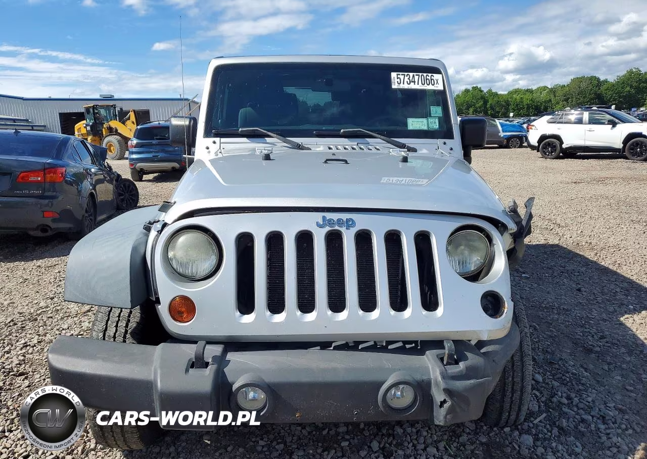 2011 Jeep Wrangler Sport VIN:1J4AA2D11BL609089 - 5
