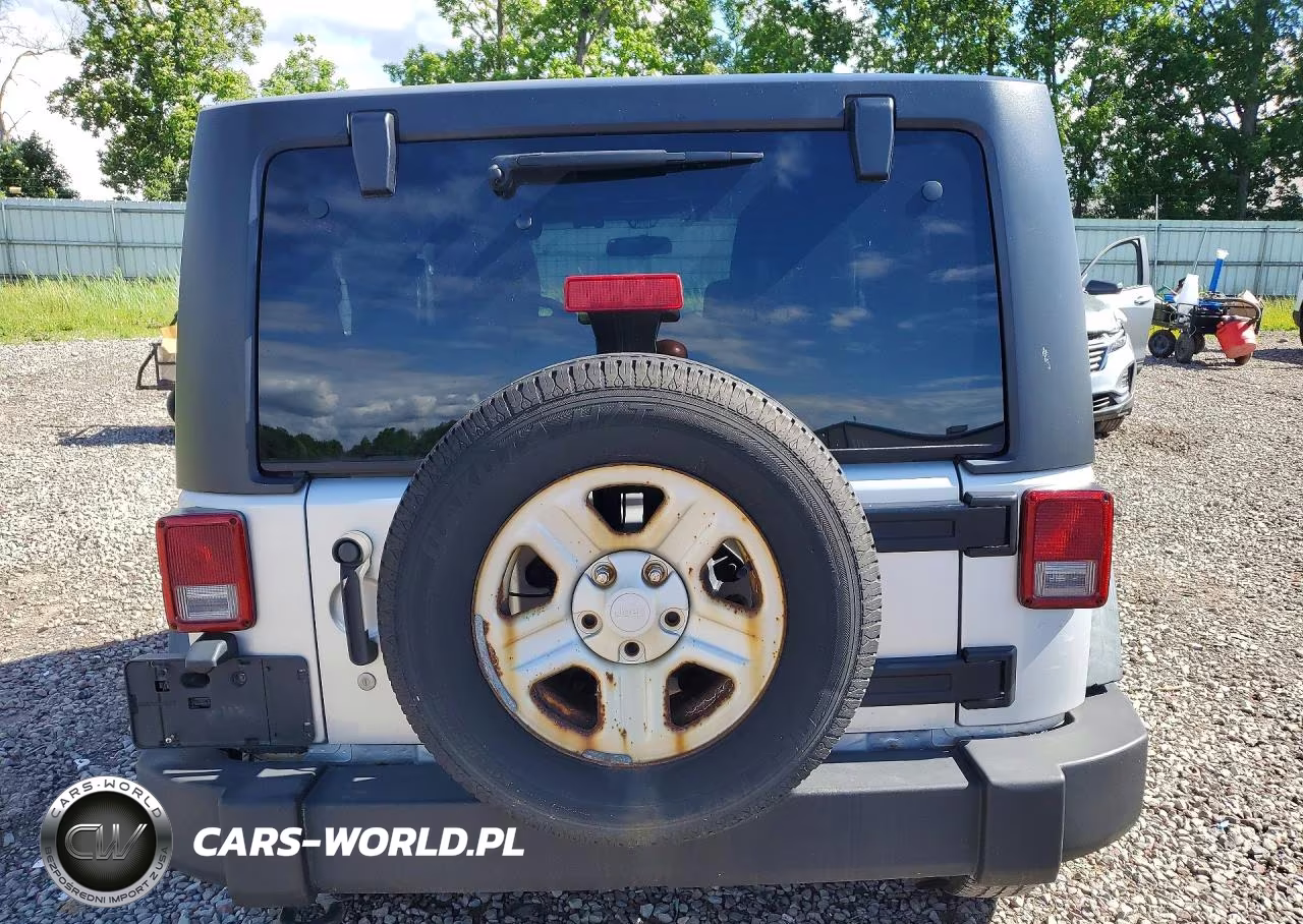 2011 Jeep Wrangler Sport VIN:1J4AA2D11BL609089 - 6