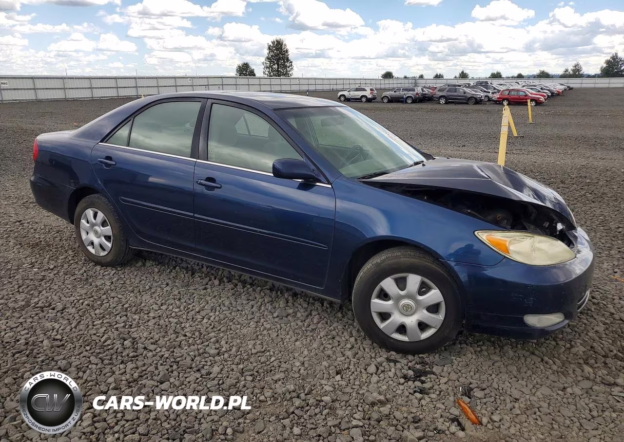 2002 Toyota Camry Le VIN:JTDBE32K720003457 - 4