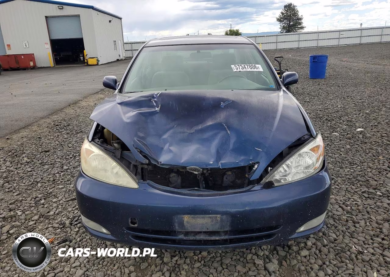 2002 Toyota Camry Le VIN:JTDBE32K720003457 - 5