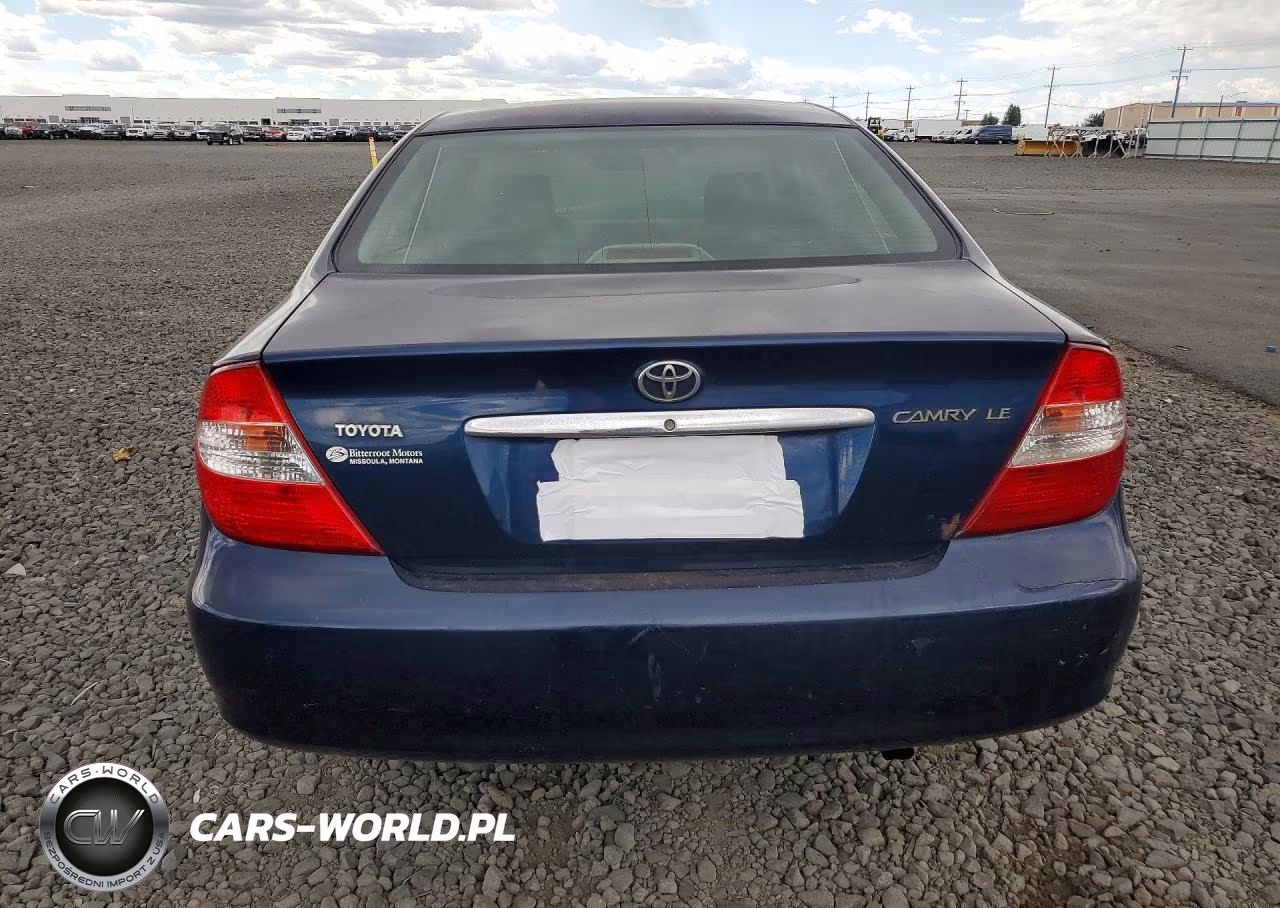 2002 Toyota Camry Le VIN:JTDBE32K720003457 - 6