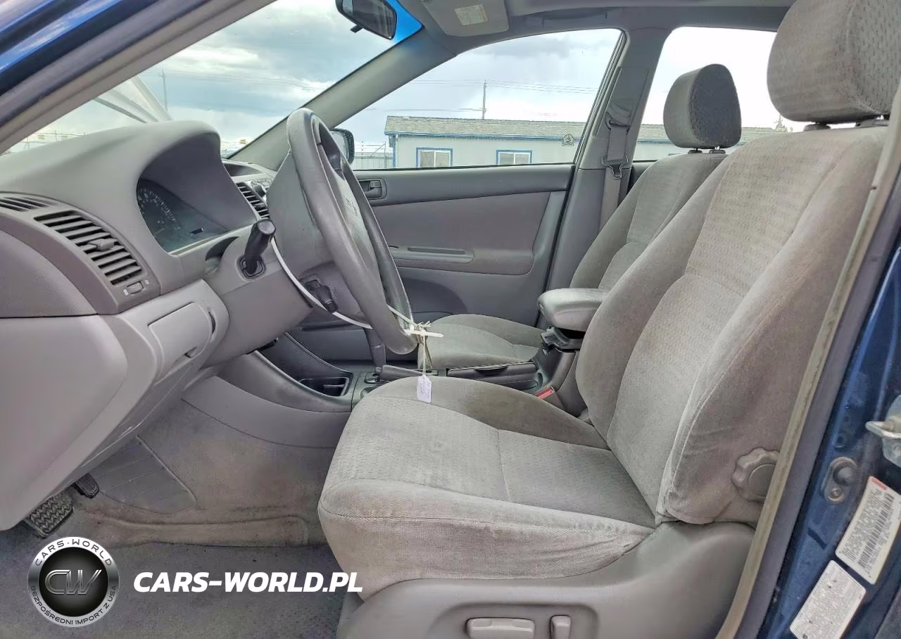 2002 Toyota Camry Le VIN:JTDBE32K720003457 - 7