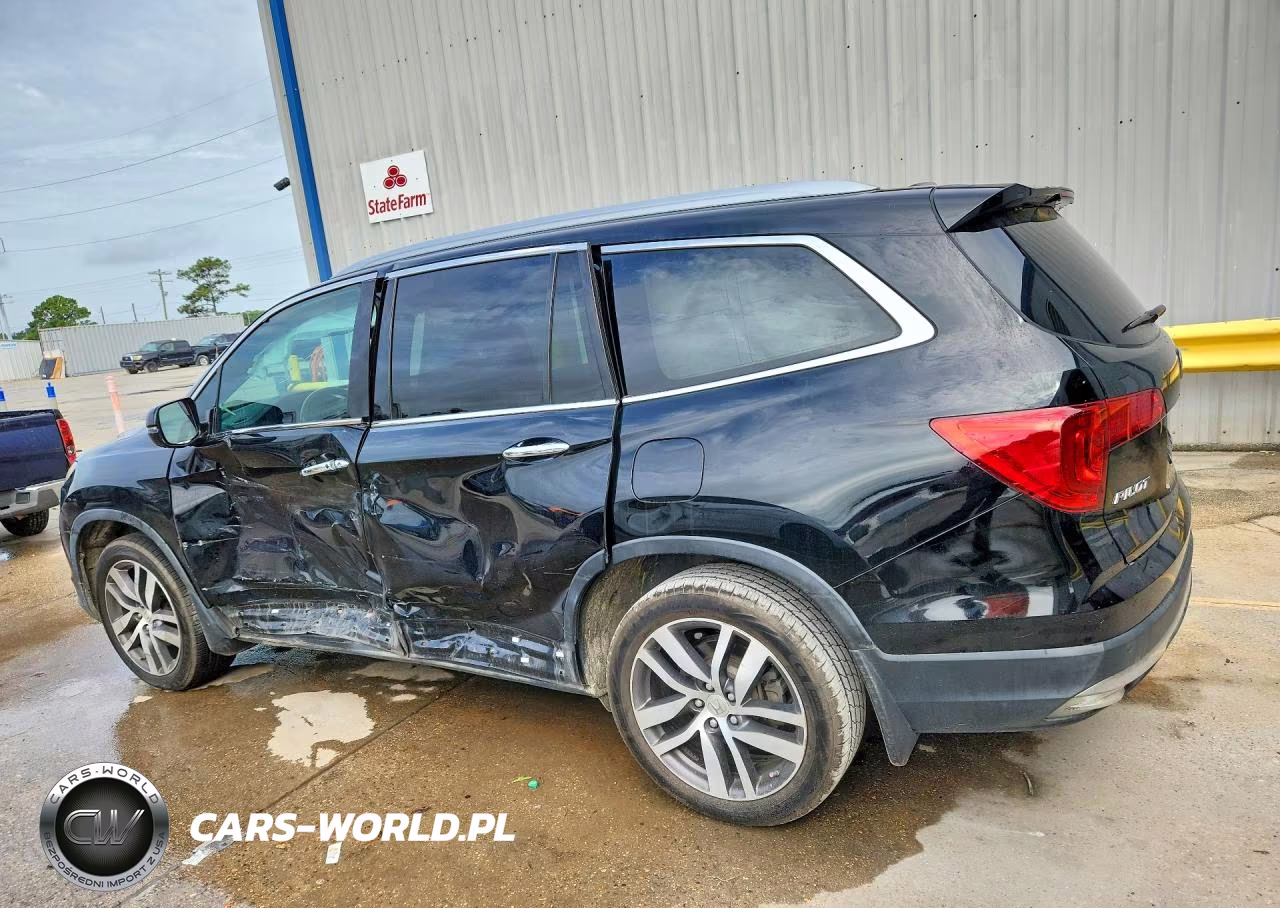 2018 Honda Pilot Touring VIN:5FNYF5H90JB009558 - 2