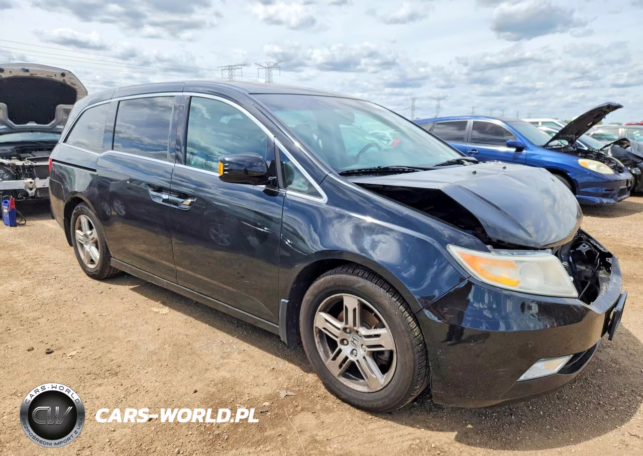 2012 Honda Odyssey Touring VIN:5FNRL5H97CB068929 - 4