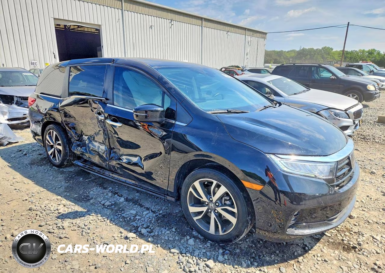 2023 Honda Odyssey Touring VIN:5FNRL6H83PB060507 - 4