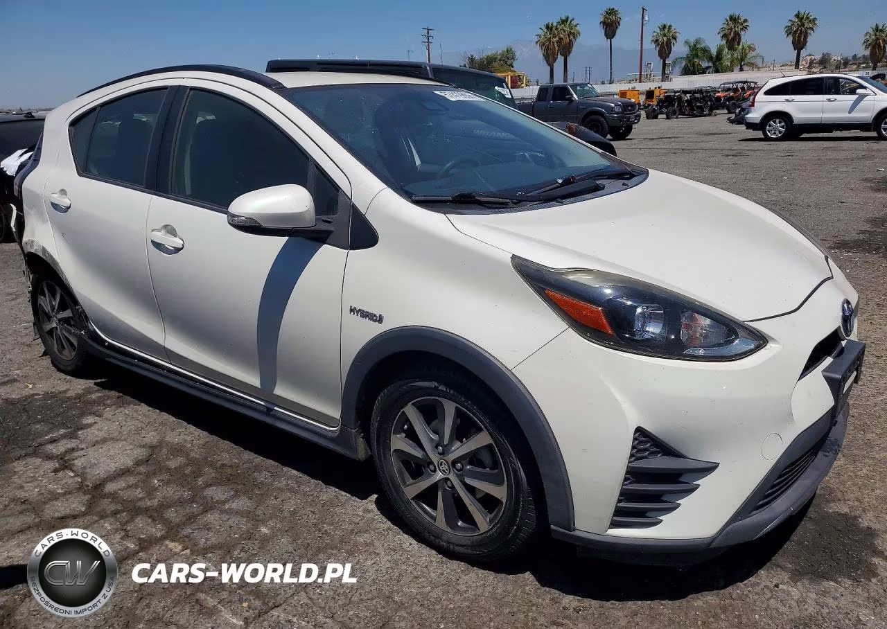 2018 Toyota Prius C Two VIN:JTDKDTB32J1605977 - 4