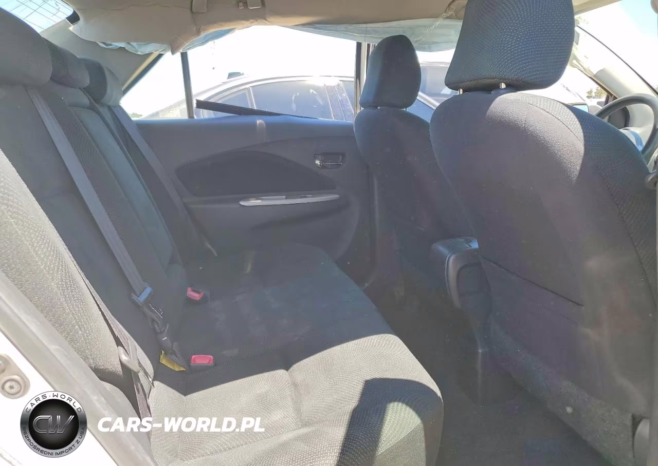 2009 Toyota Yaris Base VIN:JTDBT903694044752 - 10