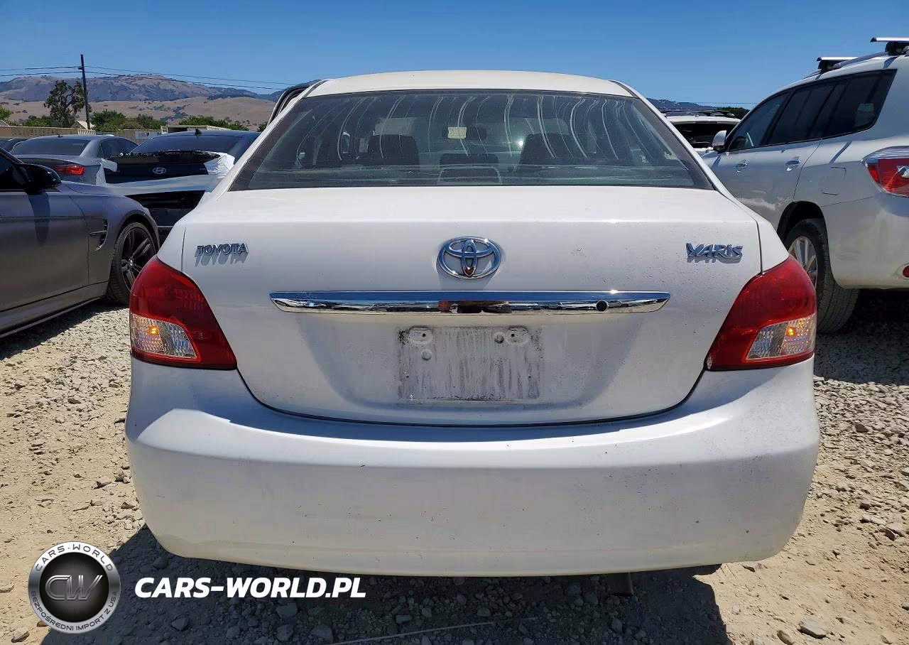 2009 Toyota Yaris Base VIN:JTDBT903694044752 - 6