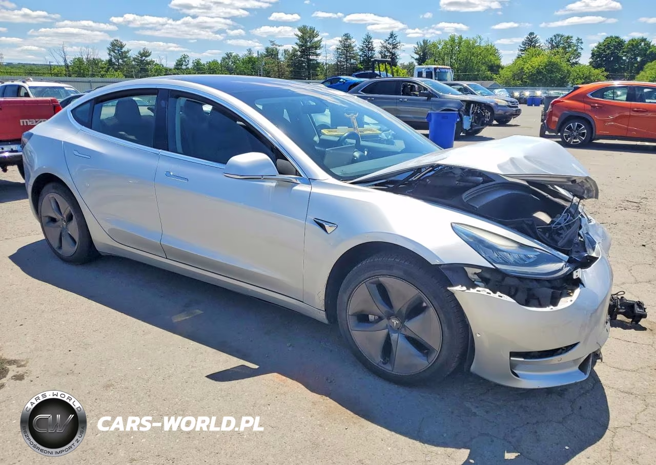 2018 Tesla Model 3 VIN:5YJ3E1EAXJF045973 - 4