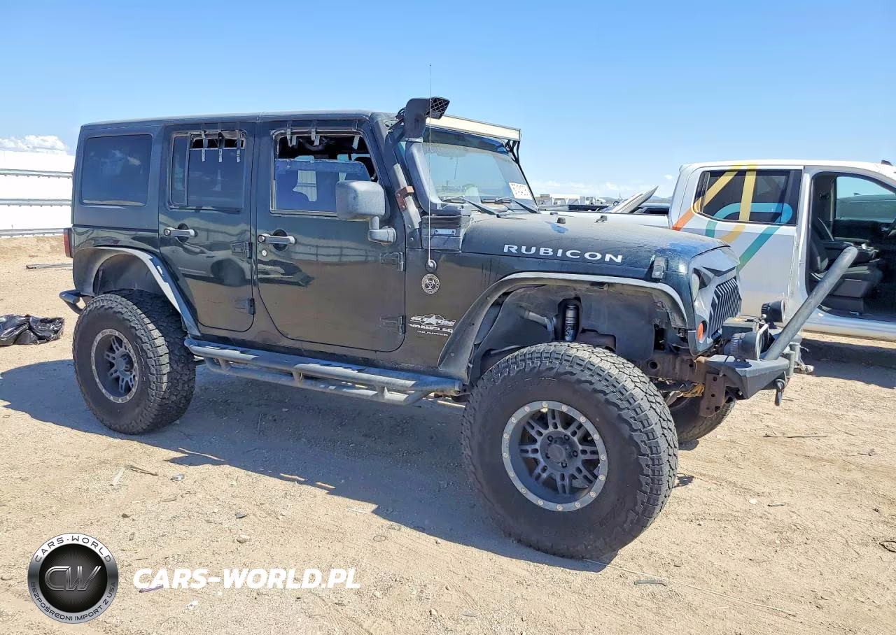 2012 Jeep Wrangler Unlimited Rubicon VIN:1C4BJWFGXCL178580 - 4