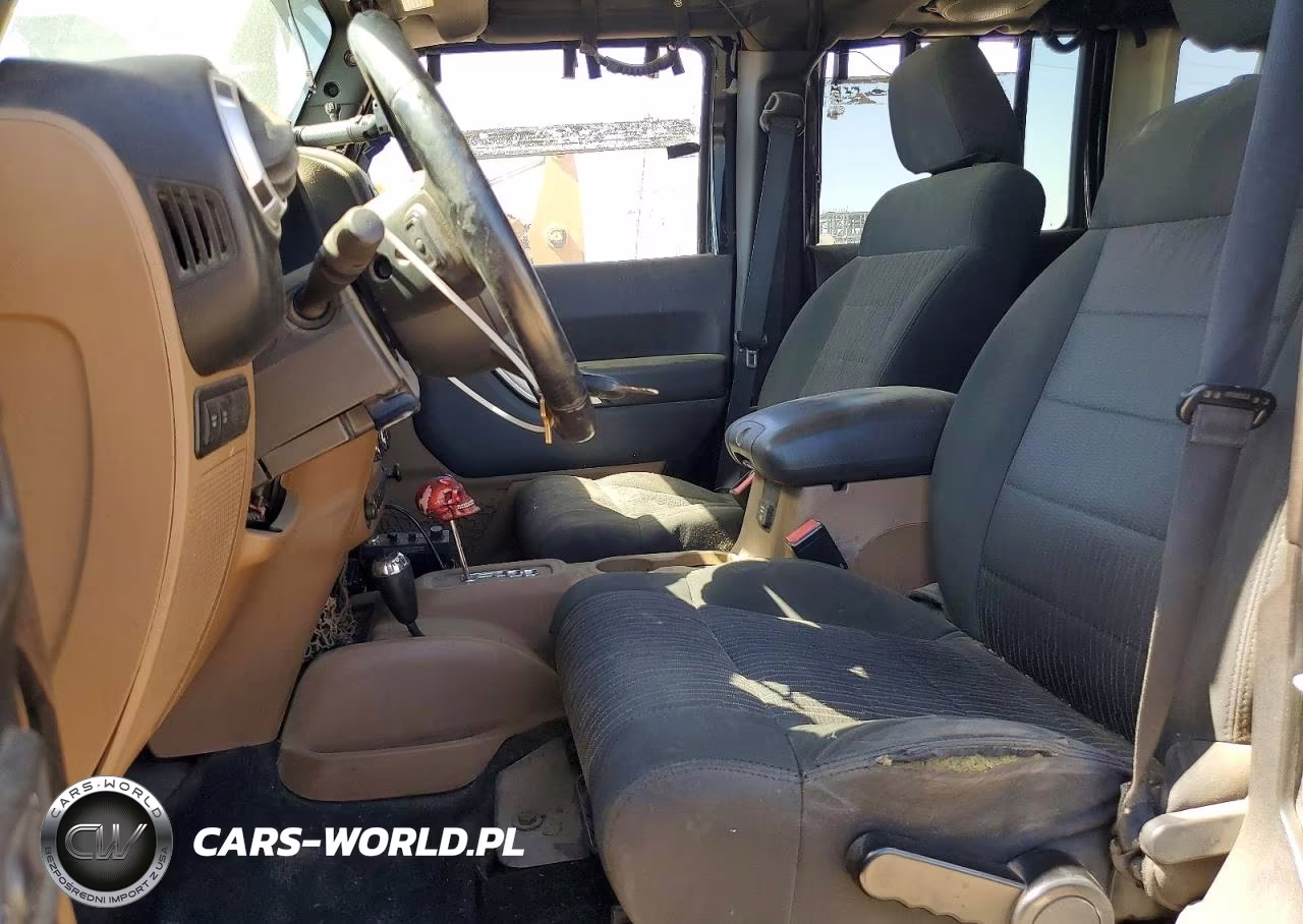 2012 Jeep Wrangler Unlimited Rubicon VIN:1C4BJWFGXCL178580 - 7