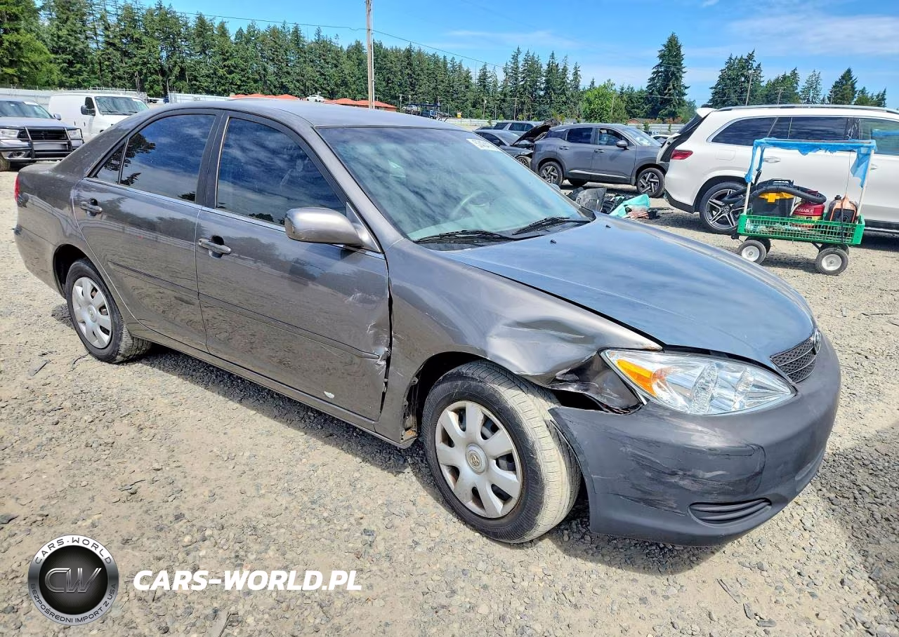 2004 Toyota Camry Le VIN:JTDBE32K340297653 - 4