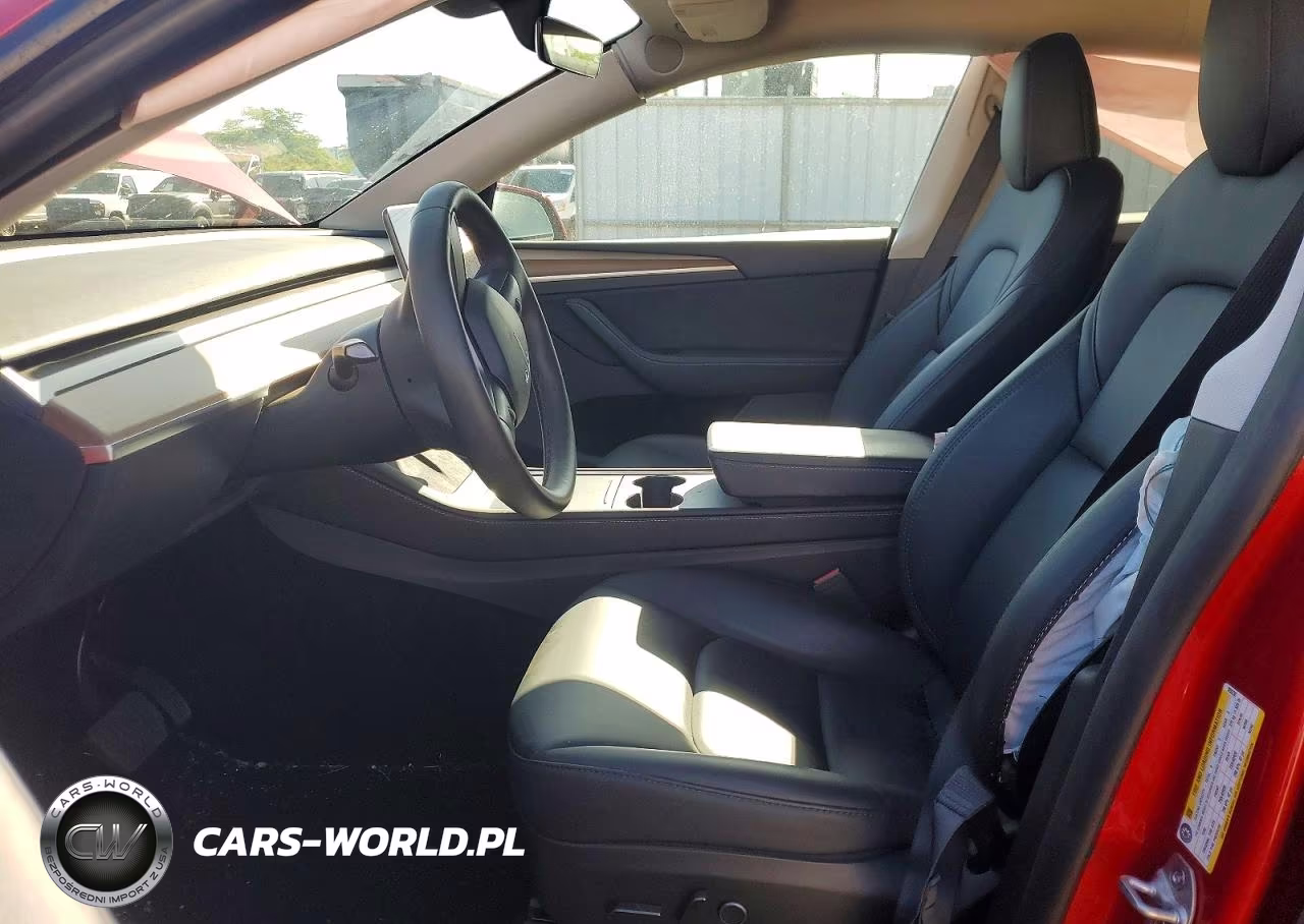 2023 Tesla Model Y VIN:7SAYGDEE8PF928230 - 7