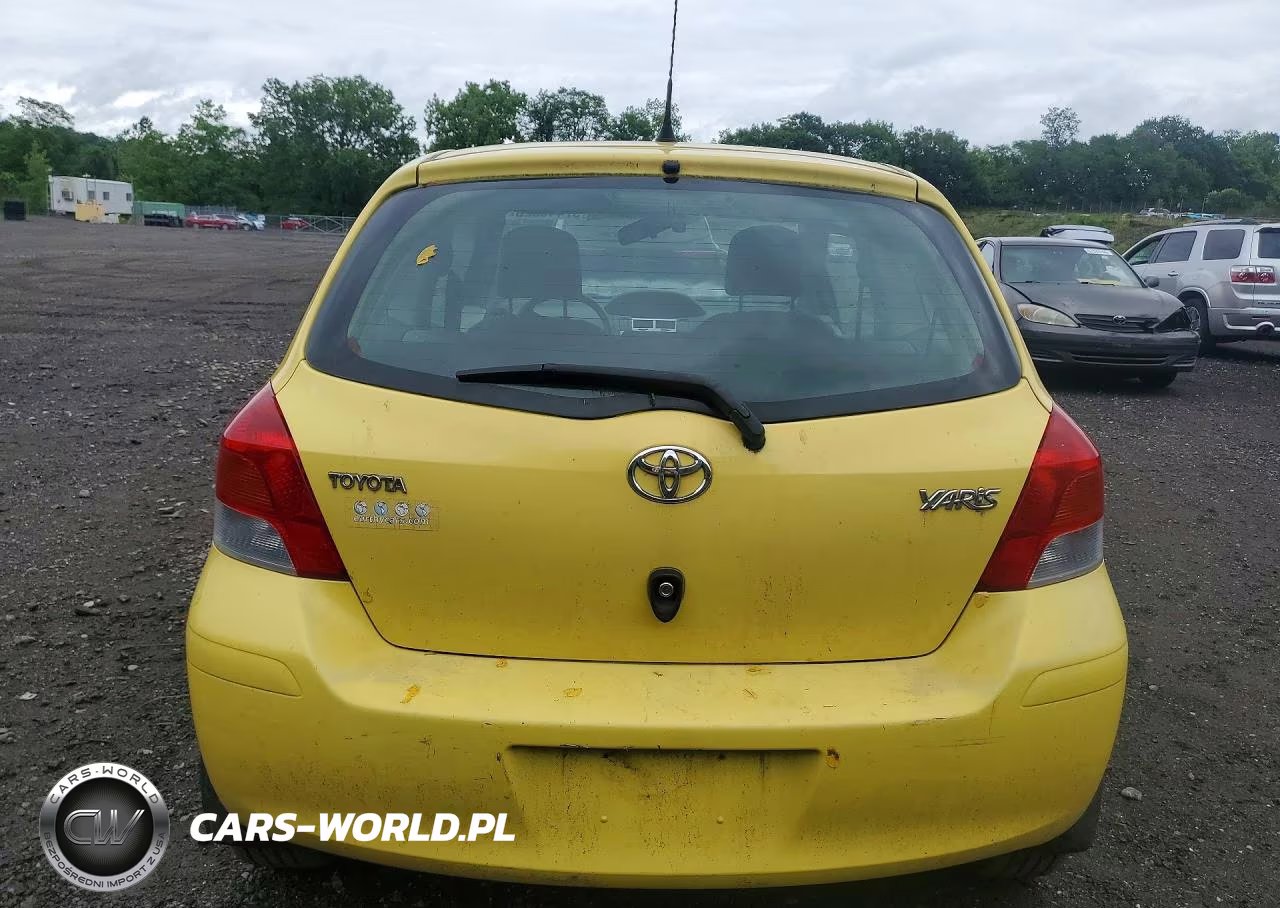 2009 Toyota Yaris Base VIN:JTDJT903X95250243 - 6