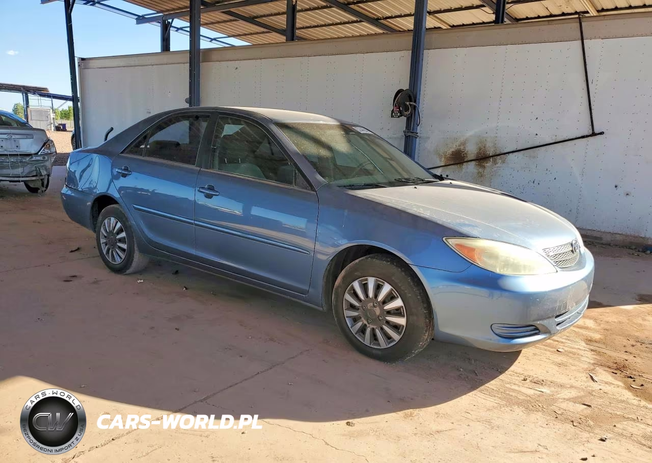 2002 Toyota Camry Le VIN:JTDBE30K120116162 - 4