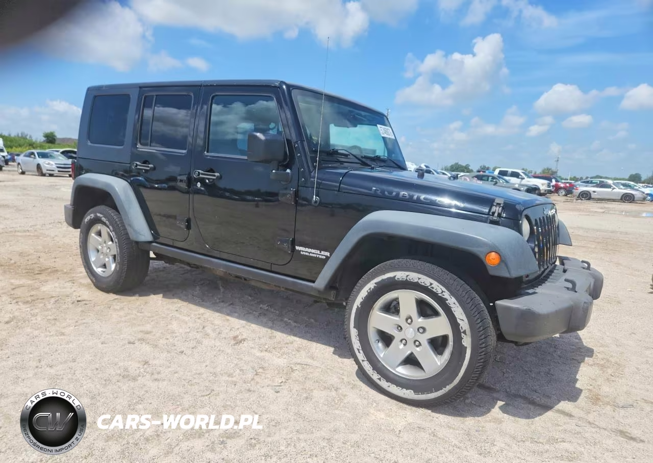 2010 Jeep Wrangler Unlimited Rubicon VIN:1J4HA6H12AL187929 - 4