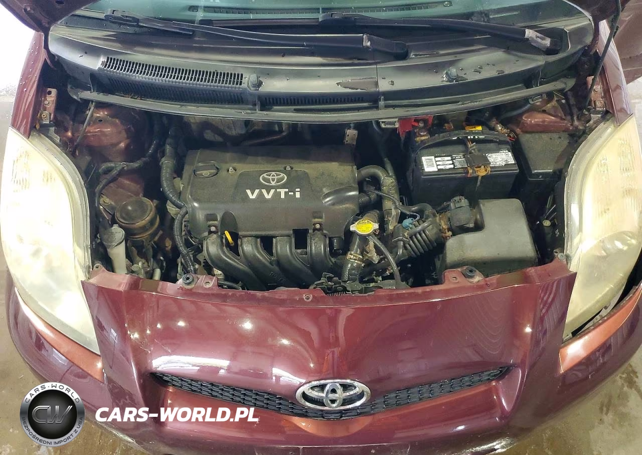 2009 Toyota Yaris Base VIN:JTDKT903595252034 - 11
