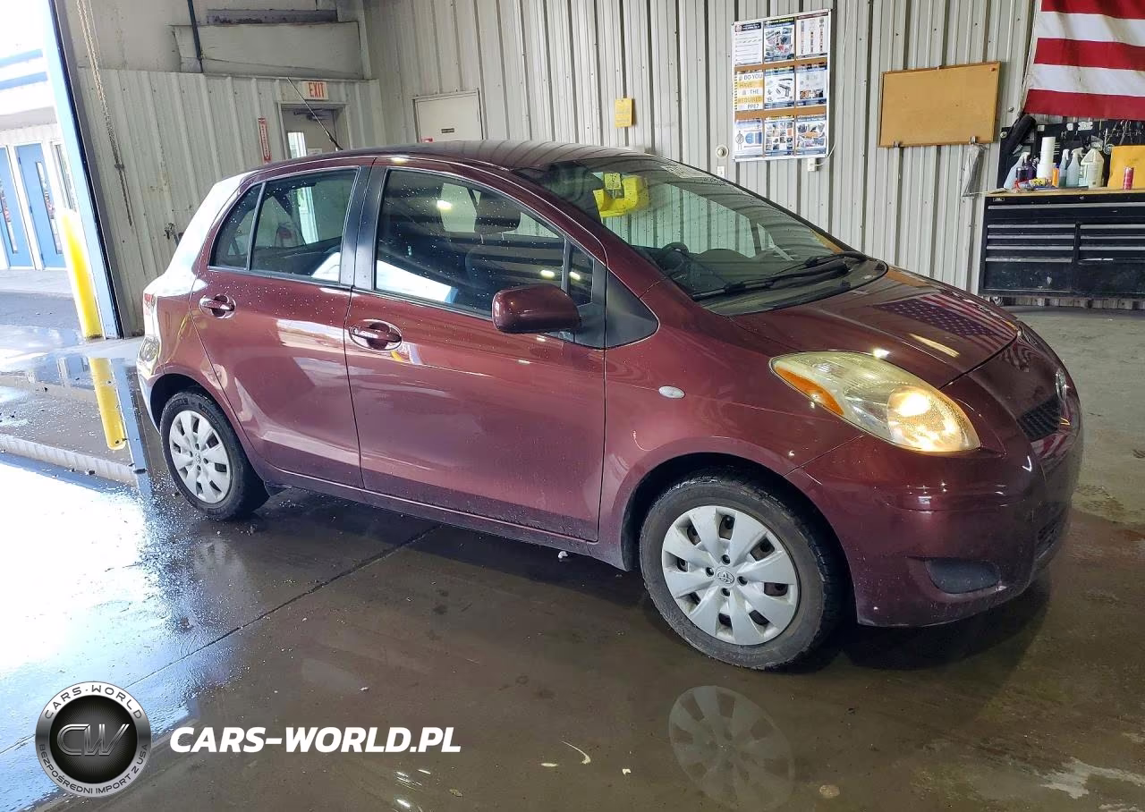2009 Toyota Yaris Base VIN:JTDKT903595252034 - 4