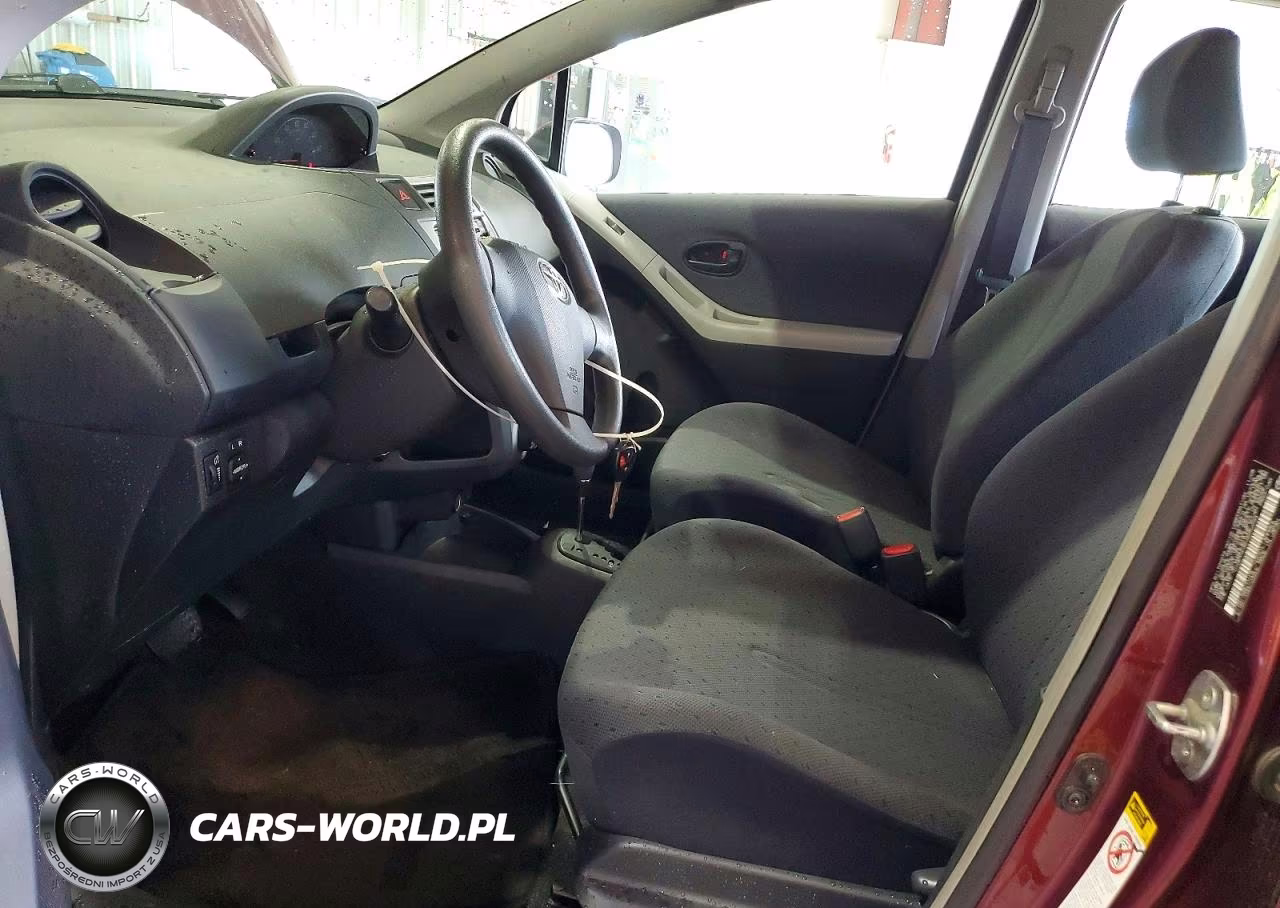 2009 Toyota Yaris Base VIN:JTDKT903595252034 - 7