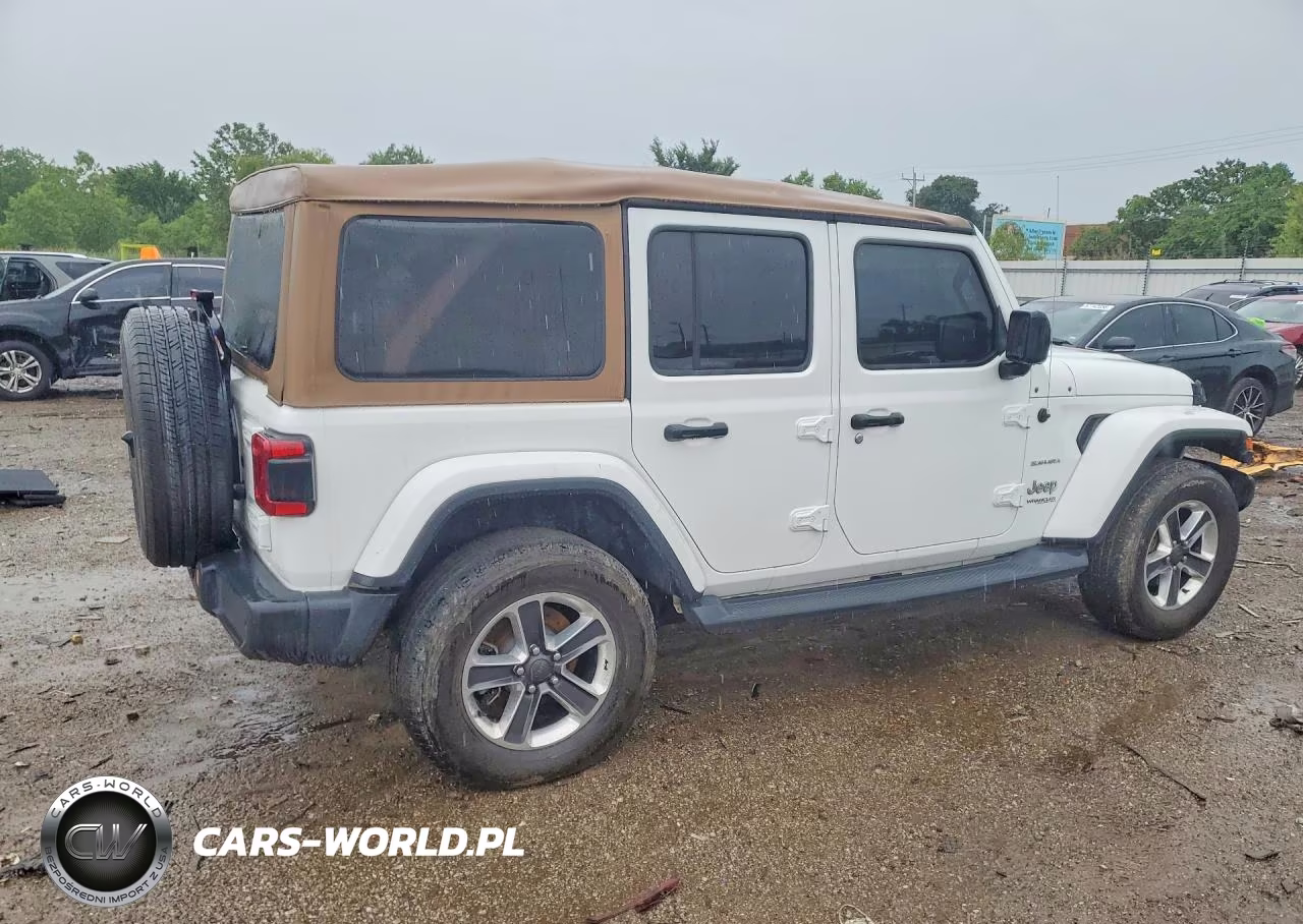 2019 Jeep Wrangler Unlimited Sahara VIN:1C4HJXEN0KW520633 - 3
