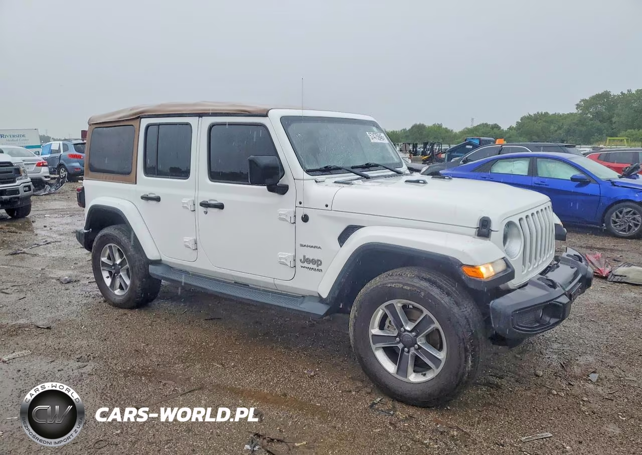 2019 Jeep Wrangler Unlimited Sahara VIN:1C4HJXEN0KW520633 - 4