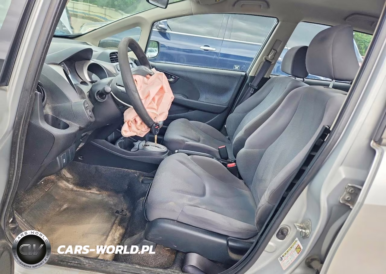 2012 Honda Fit VIN:JHMGE8H30CS002318 - 7