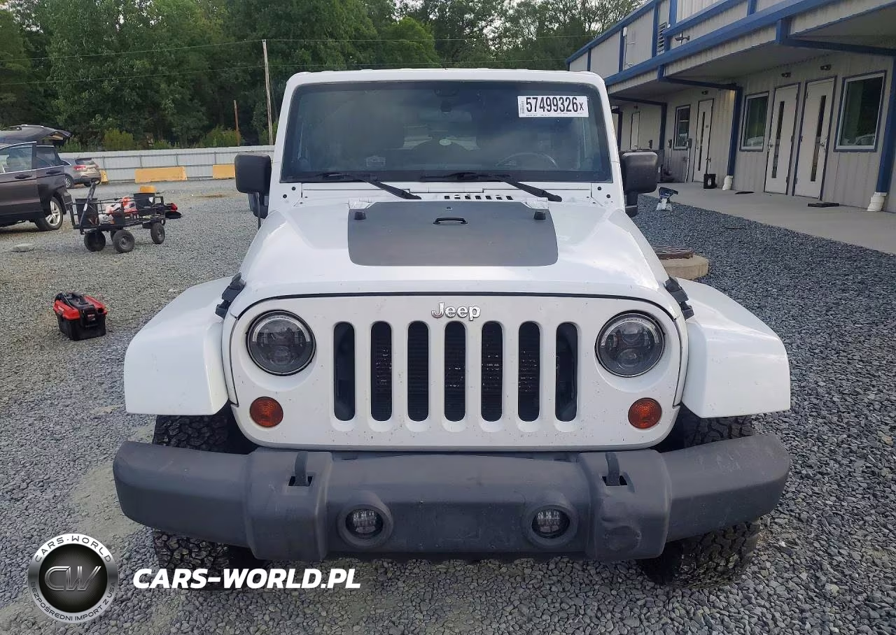 2012 Jeep Wrangler Unlimited Sahara VIN:1C4BJWEG1CL169218 - 5