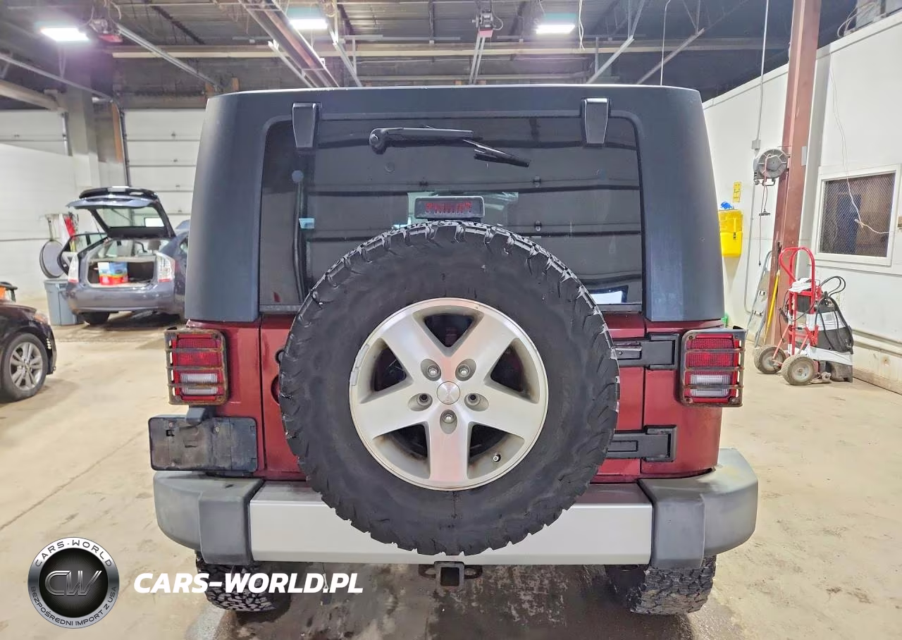 2009 Jeep Wrangler Unlimited Sahara VIN:1J4GA591X9L759460 - 6