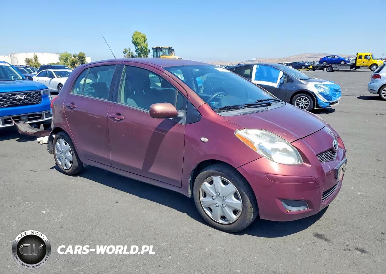 2009 Toyota Yaris Base VIN:JTDKT903X95221586 - 4