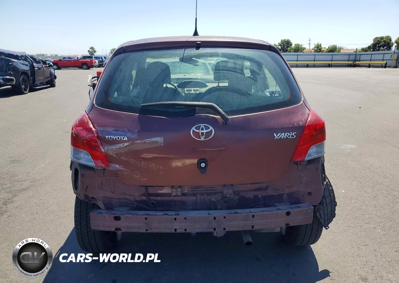2009 Toyota Yaris Base VIN:JTDKT903X95221586 - 6