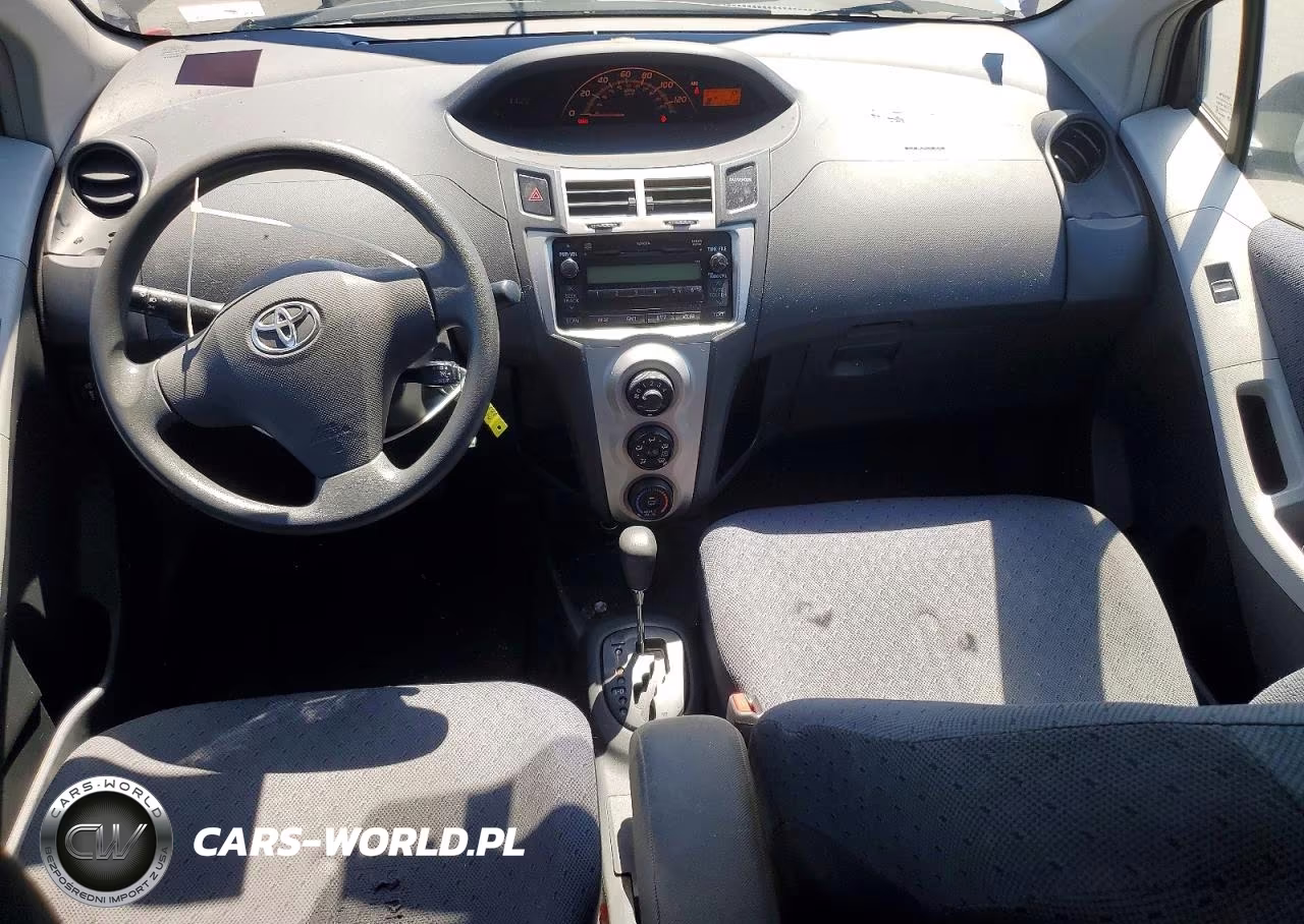 2009 Toyota Yaris Base VIN:JTDKT903X95221586 - 8