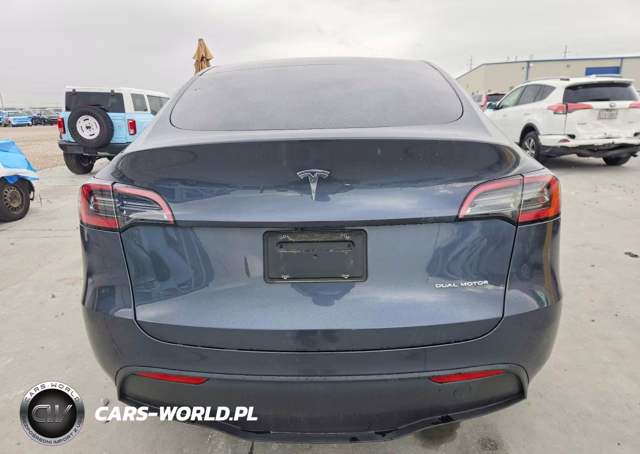 2023 Tesla Model Y VIN:7SAYGDEE5PA044937 - 6