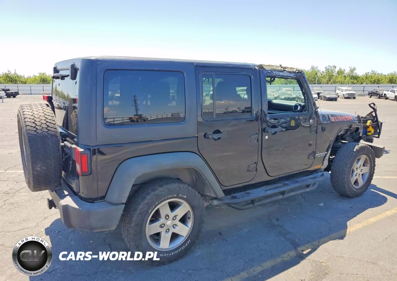 2011 Jeep Wrangler Unlimited Rubicon VIN:1J4HA6H1XBL600553 - 3