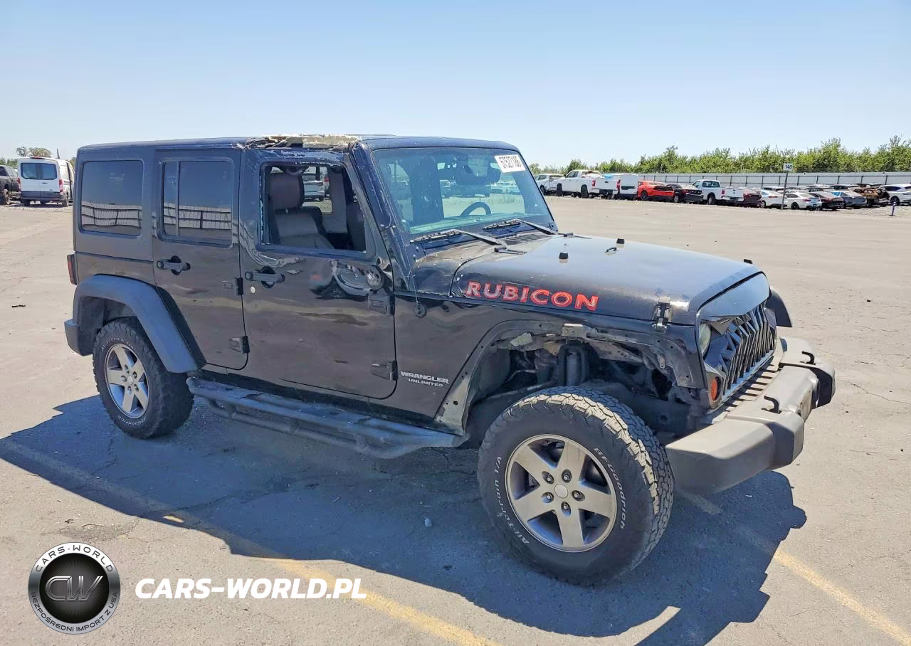2011 Jeep Wrangler Unlimited Rubicon VIN:1J4HA6H1XBL600553 - 4