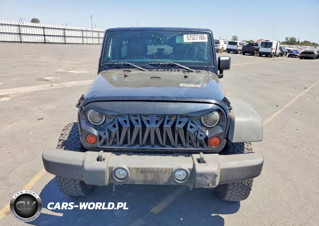 2011 Jeep Wrangler Unlimited Rubicon VIN:1J4HA6H1XBL600553 - 5